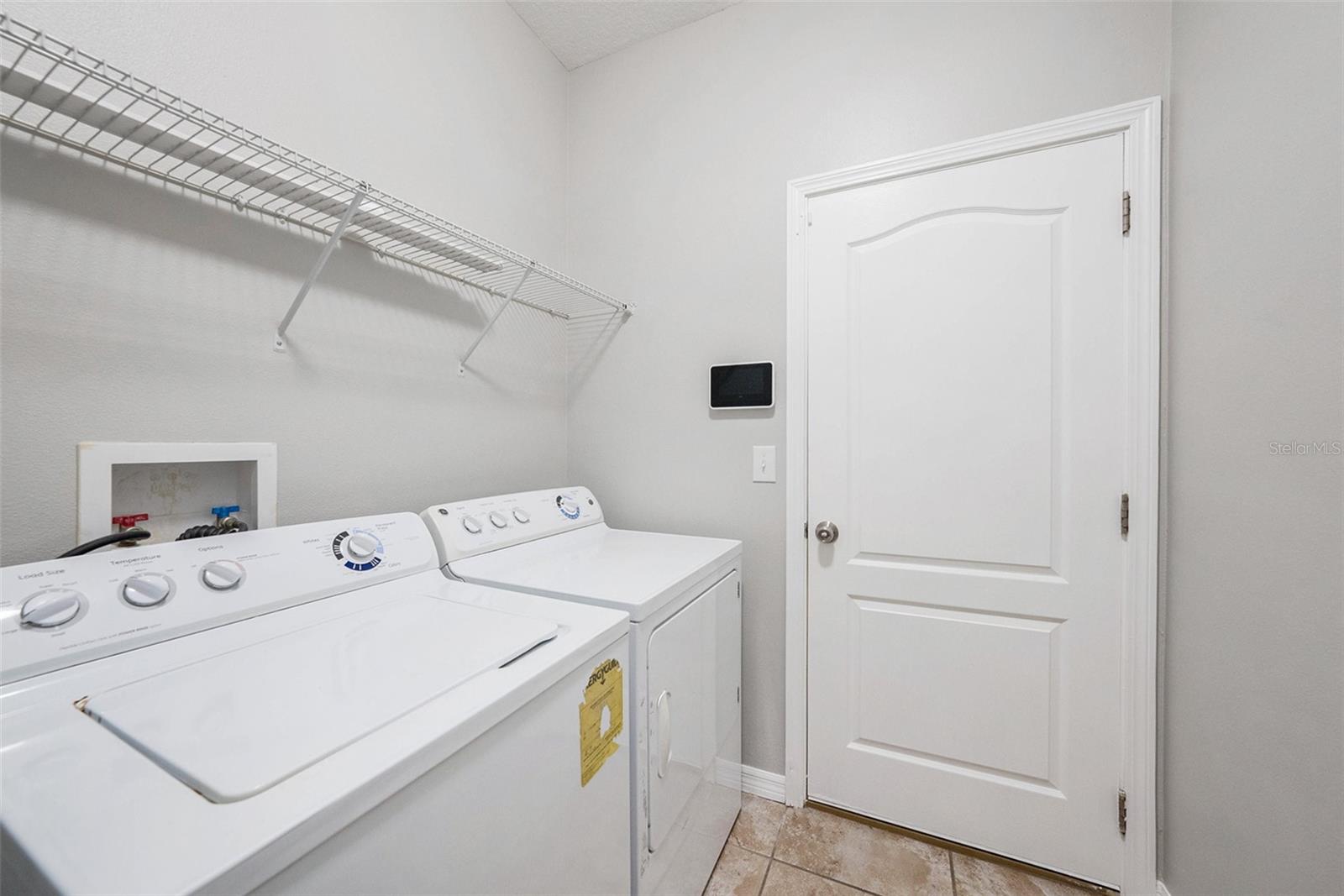 12117 Streambed Drive, Riverview FL 33579 - Triple Creek - laundry Room