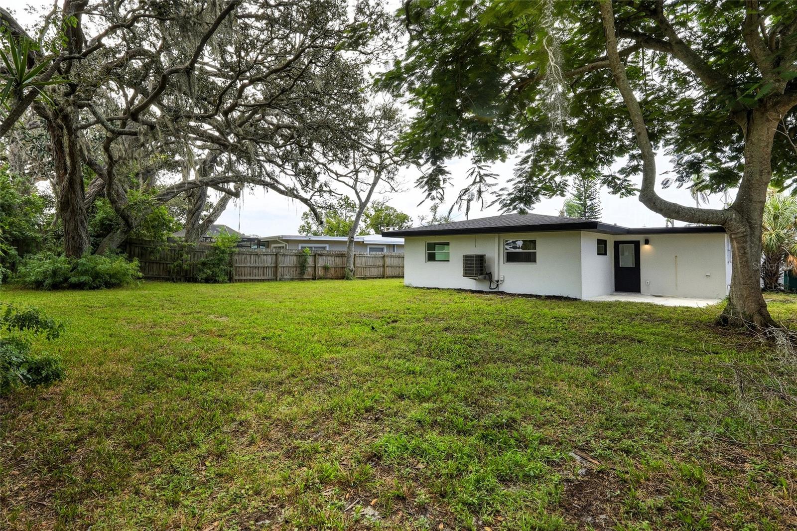 Expansive Backyard with rear gate access