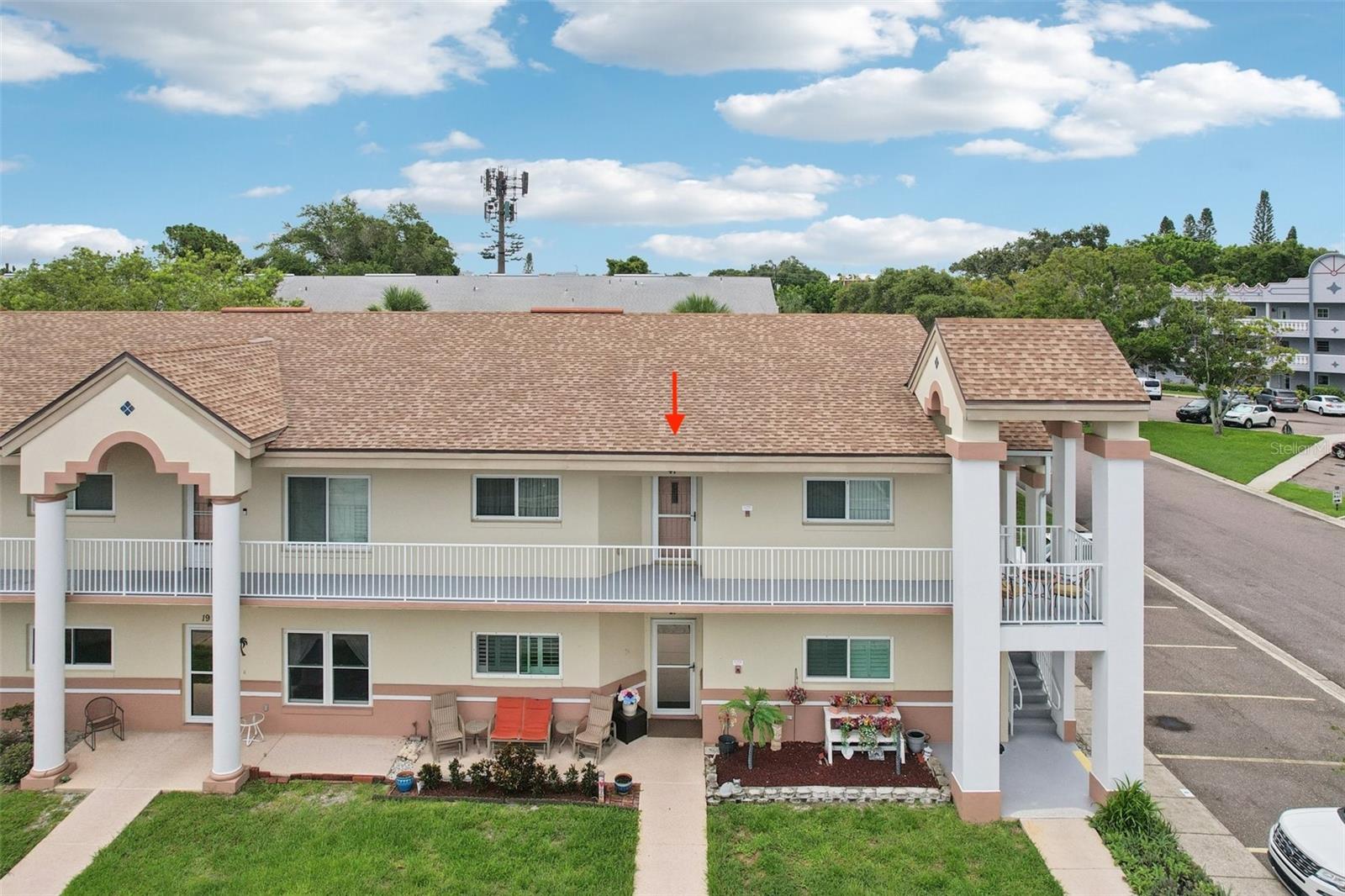 Aerial view of front door and side steps access to the condo.