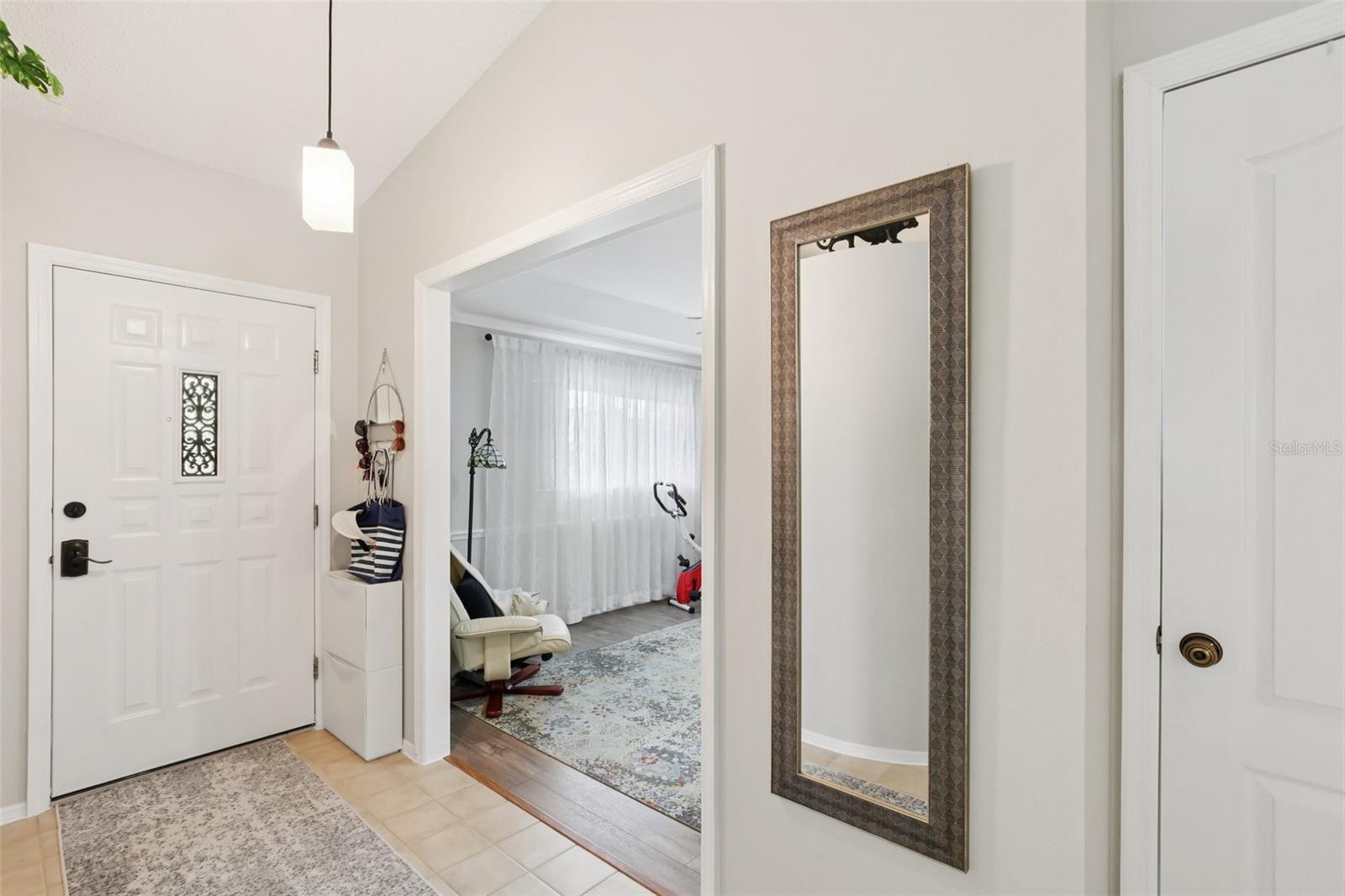 View inside front door and entrance to study.