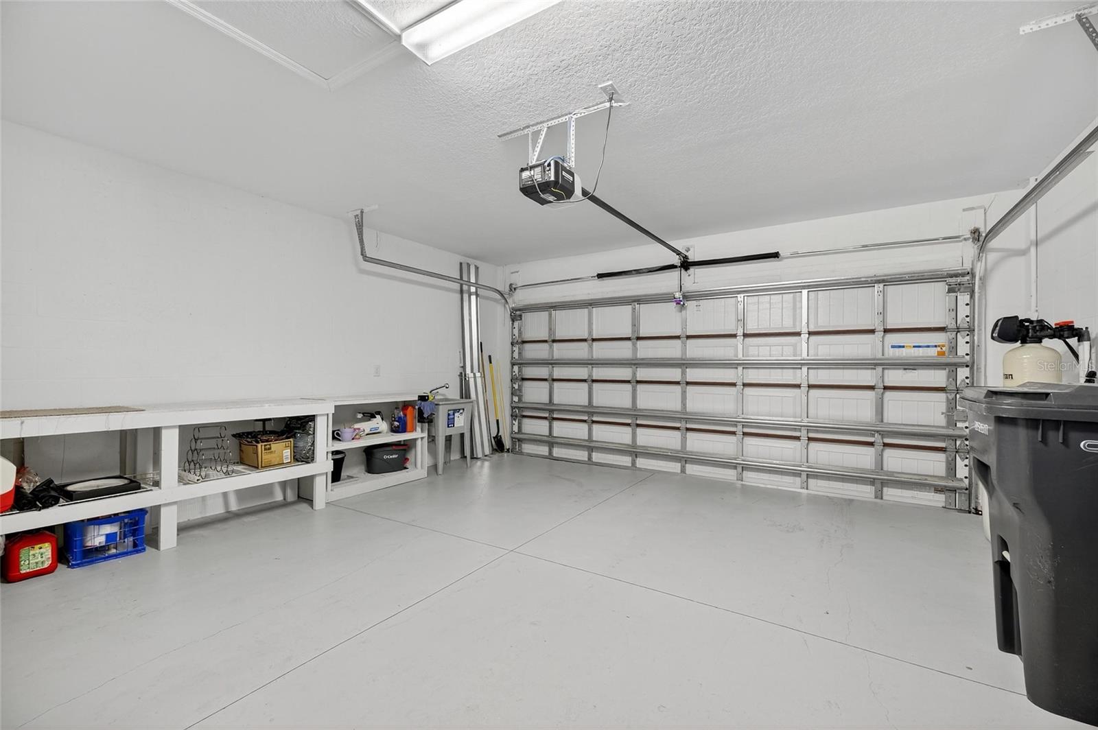 2 Car Garage w/ Custom Shelving and Sink