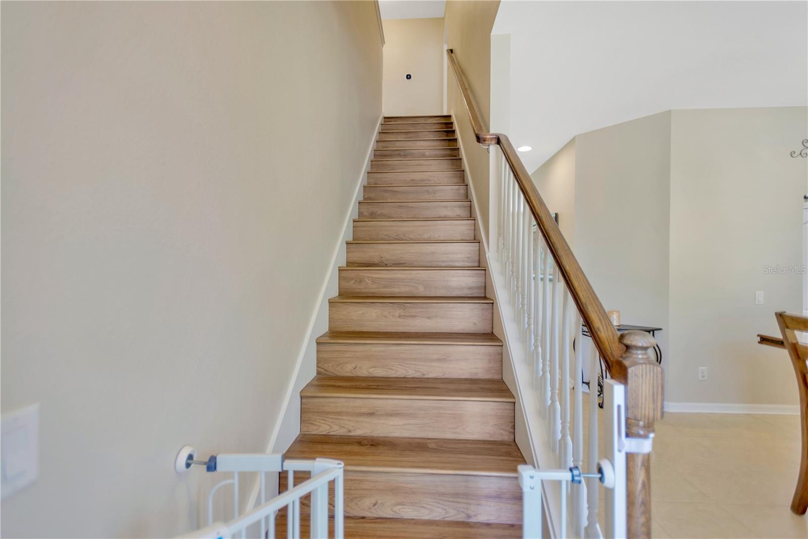 Gorgeous wide plank LVP on the stairs and second level. NO CARPET!!