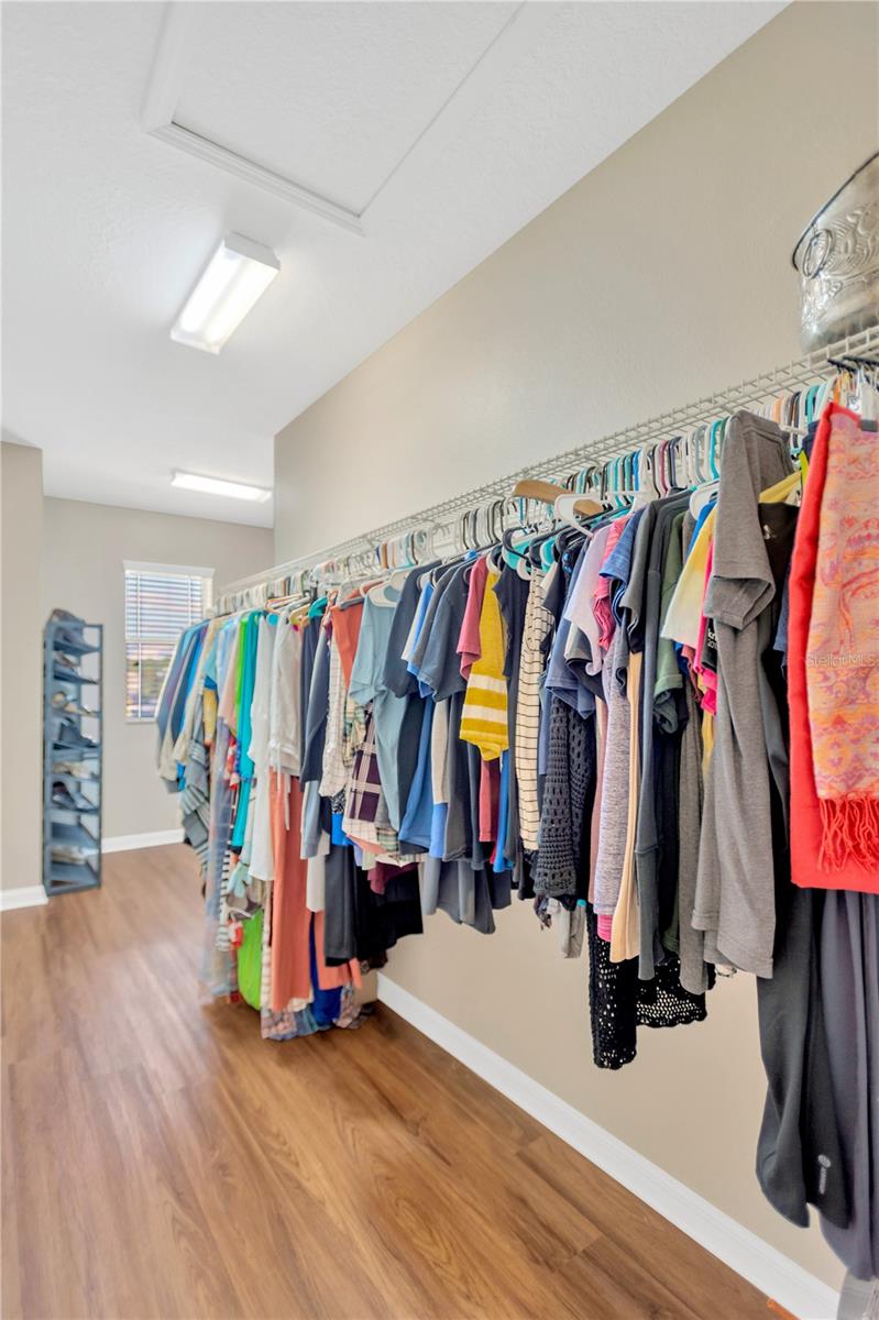 Primary #1 HUGE "L" shaped walk in closet.