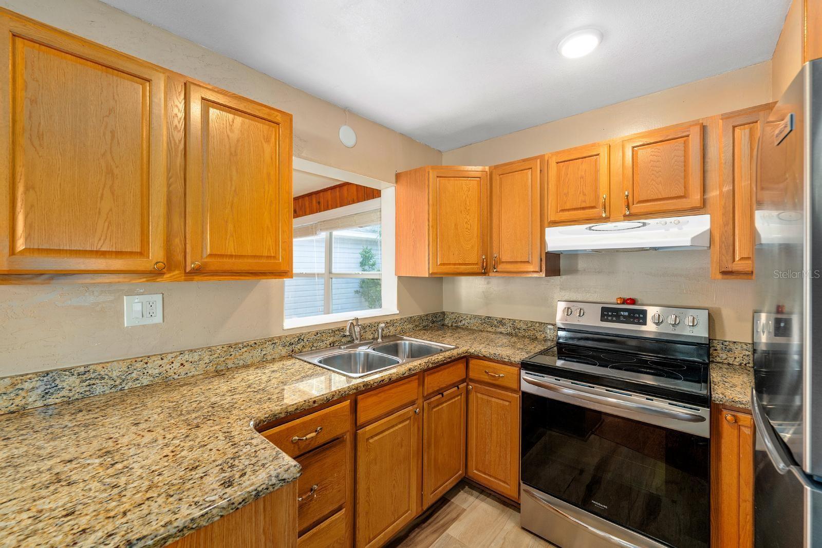 The kitchen overlooks the family room, allowing you to cook and entertain without missing a moment.