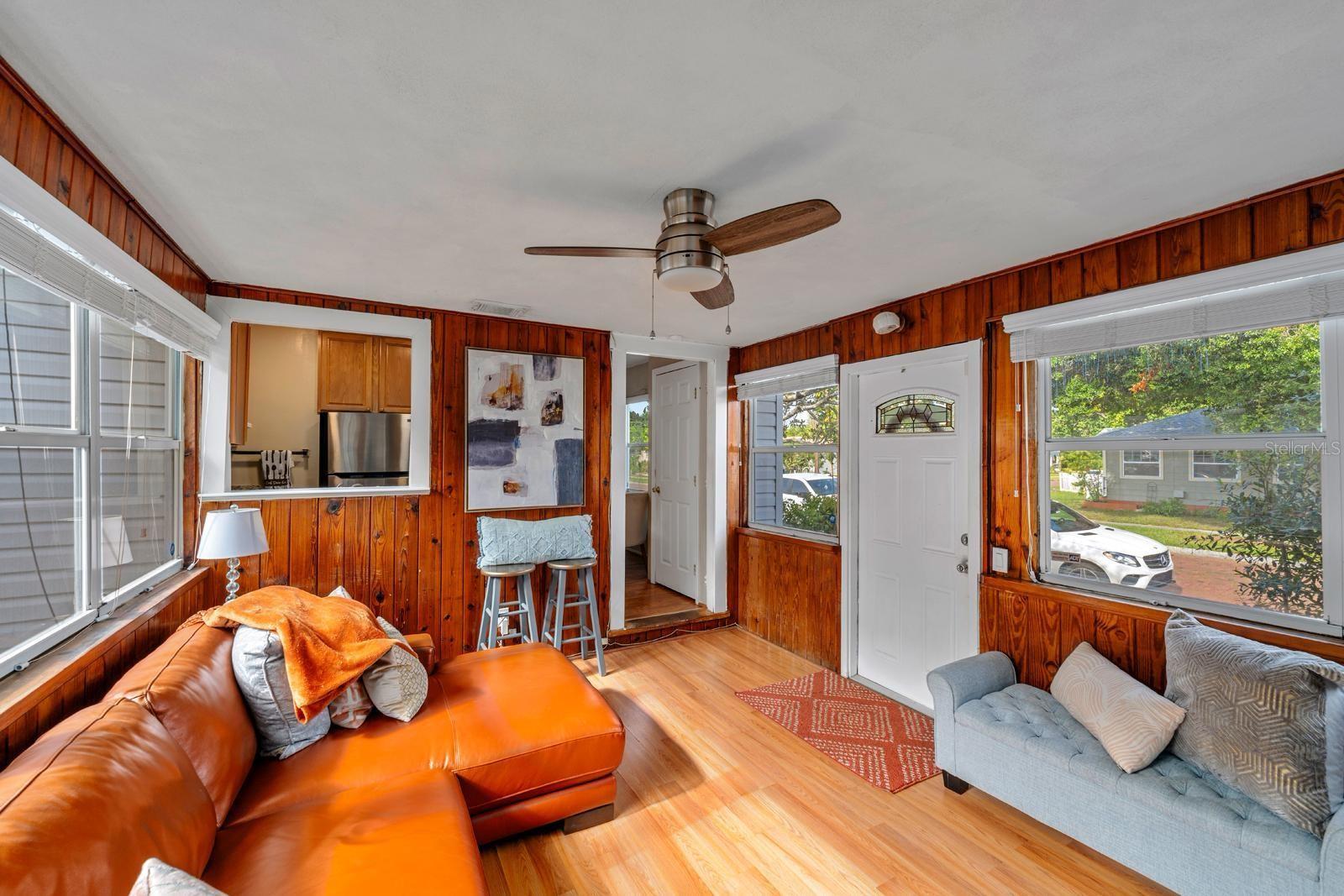 Step into the oversized family room off the kitchen, where stunning flooring and abundant sunlight make it a comfortable hub for everyday living.