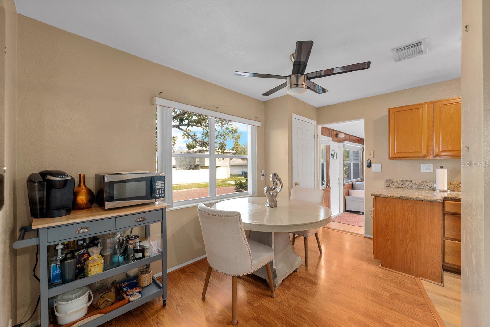 Just off the living room, you'll find the kitchen and dining area—perfectly connected for everyday living and effortless entertaining