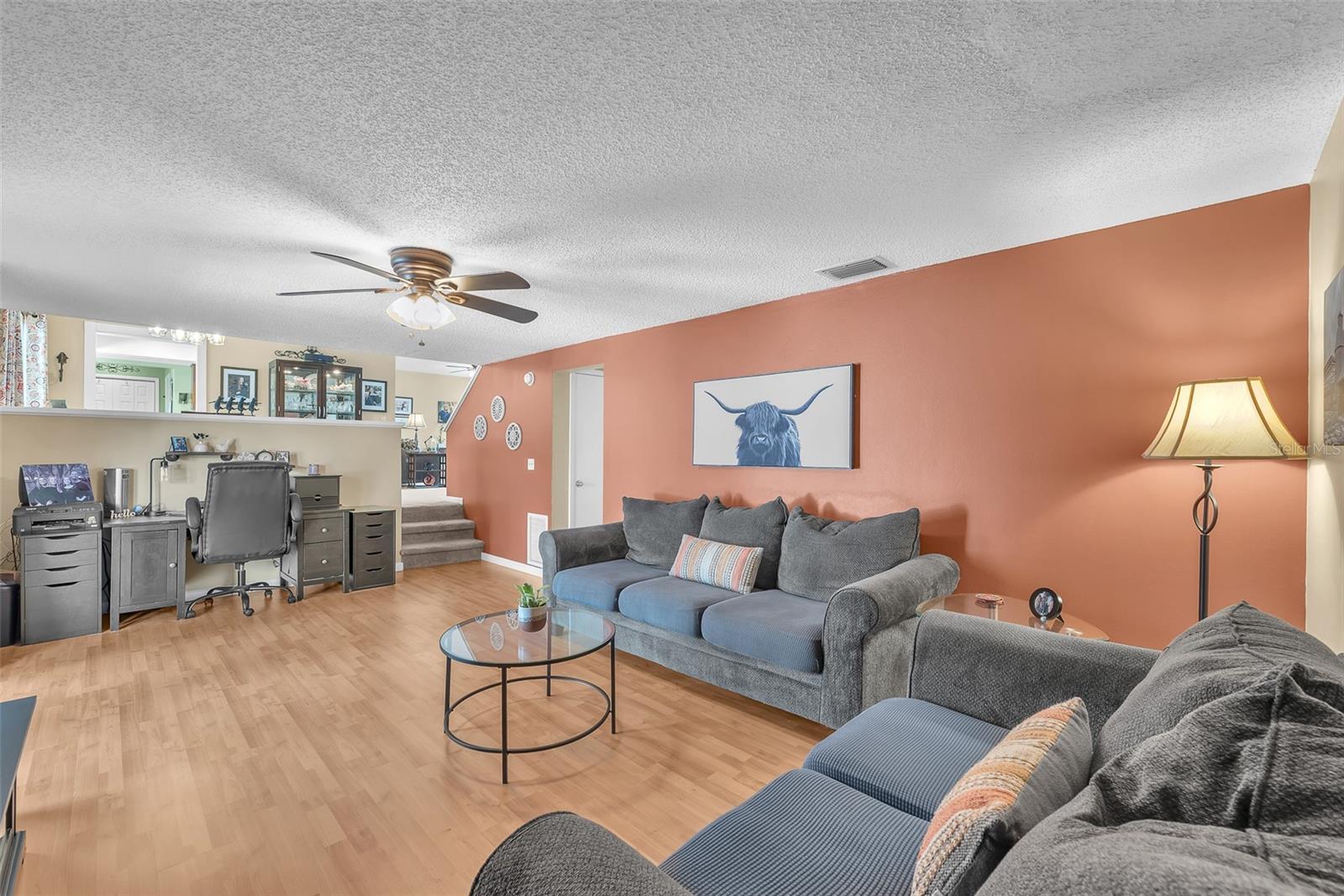 The family room is 3 steps away from the Dining room/Kitchen for seamless flow.