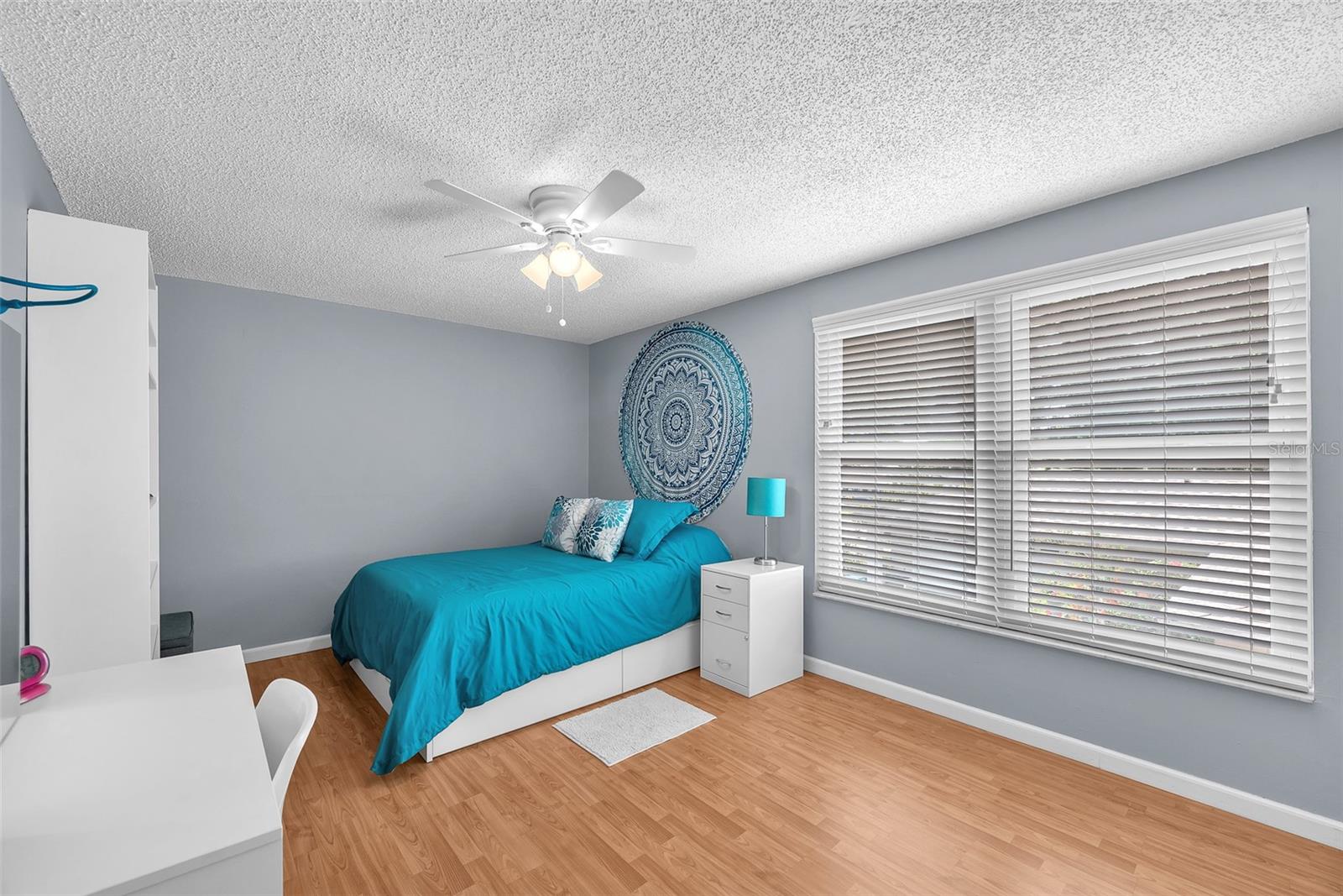 Bedroom #3 on the upper level is 14.75 x 10 and shares access to a full hall bathroom.