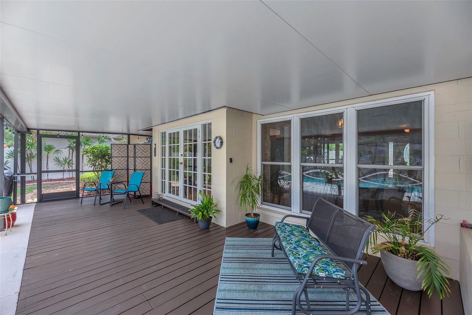 This back porch has easy access to the Kitchen.