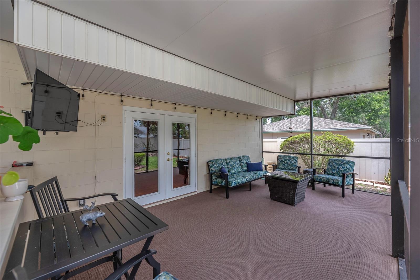 The lower back porch has direct access to the family room and a full bathroom.