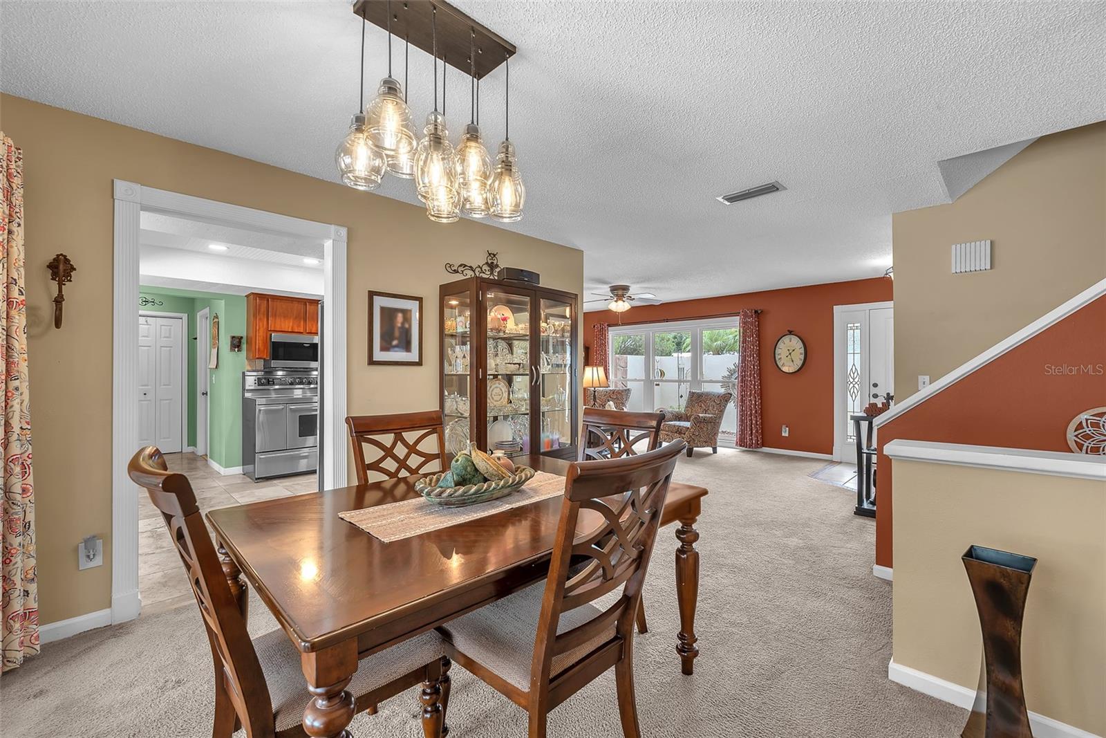 The dining room is steps from the kitchen making entertaining a breeze.