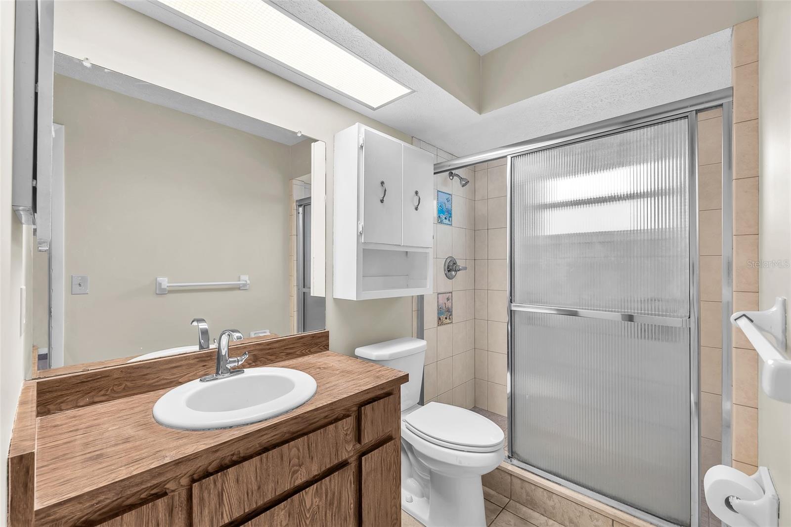 The primary ensuite has a step in shower.