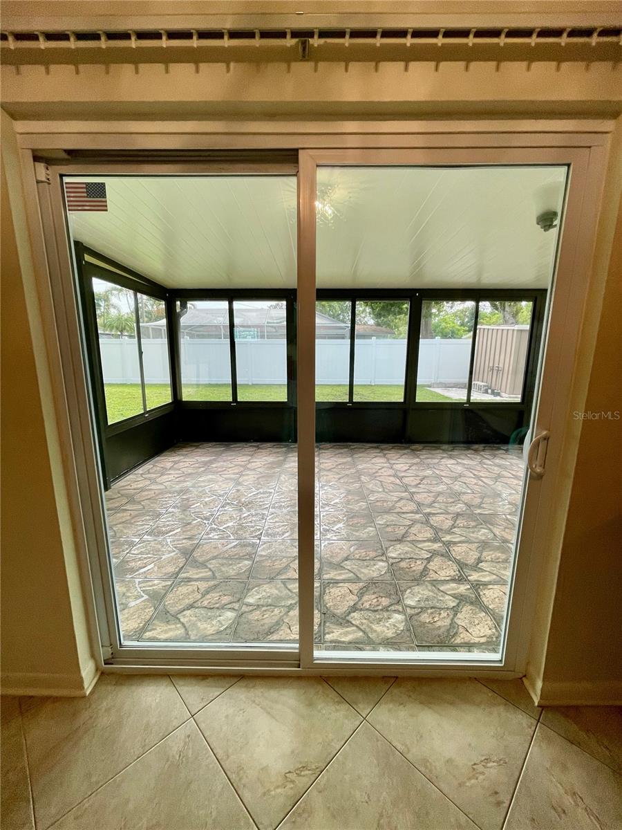New sliding door which opens up the large Family room