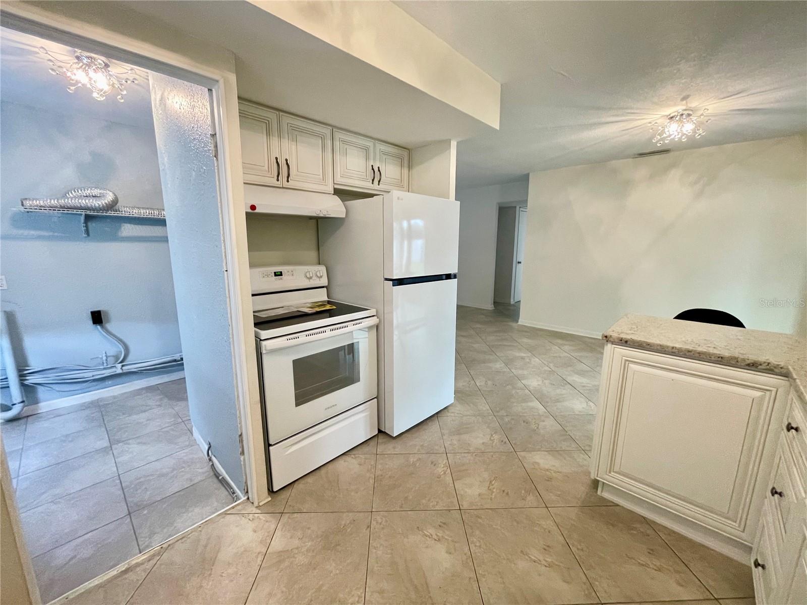 New refrigerator in the last couple of months, looking into the laundry/utility room