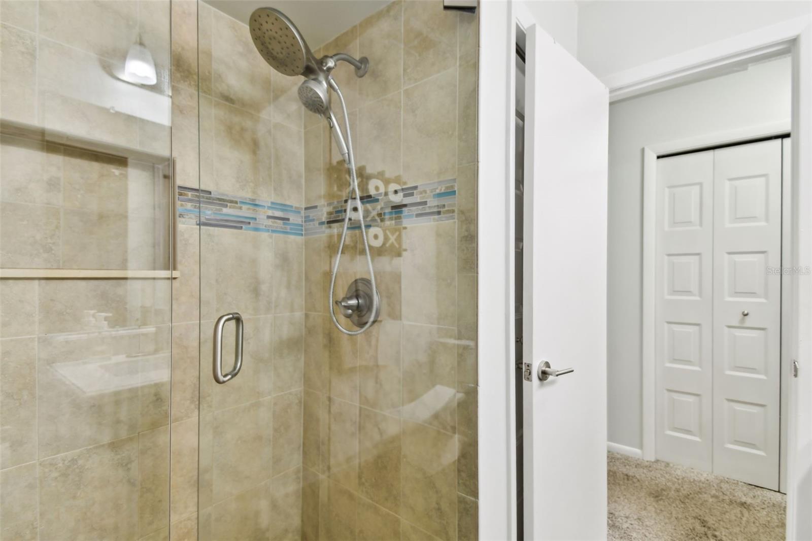Sleek Walk-In Shower & Designer Finishes