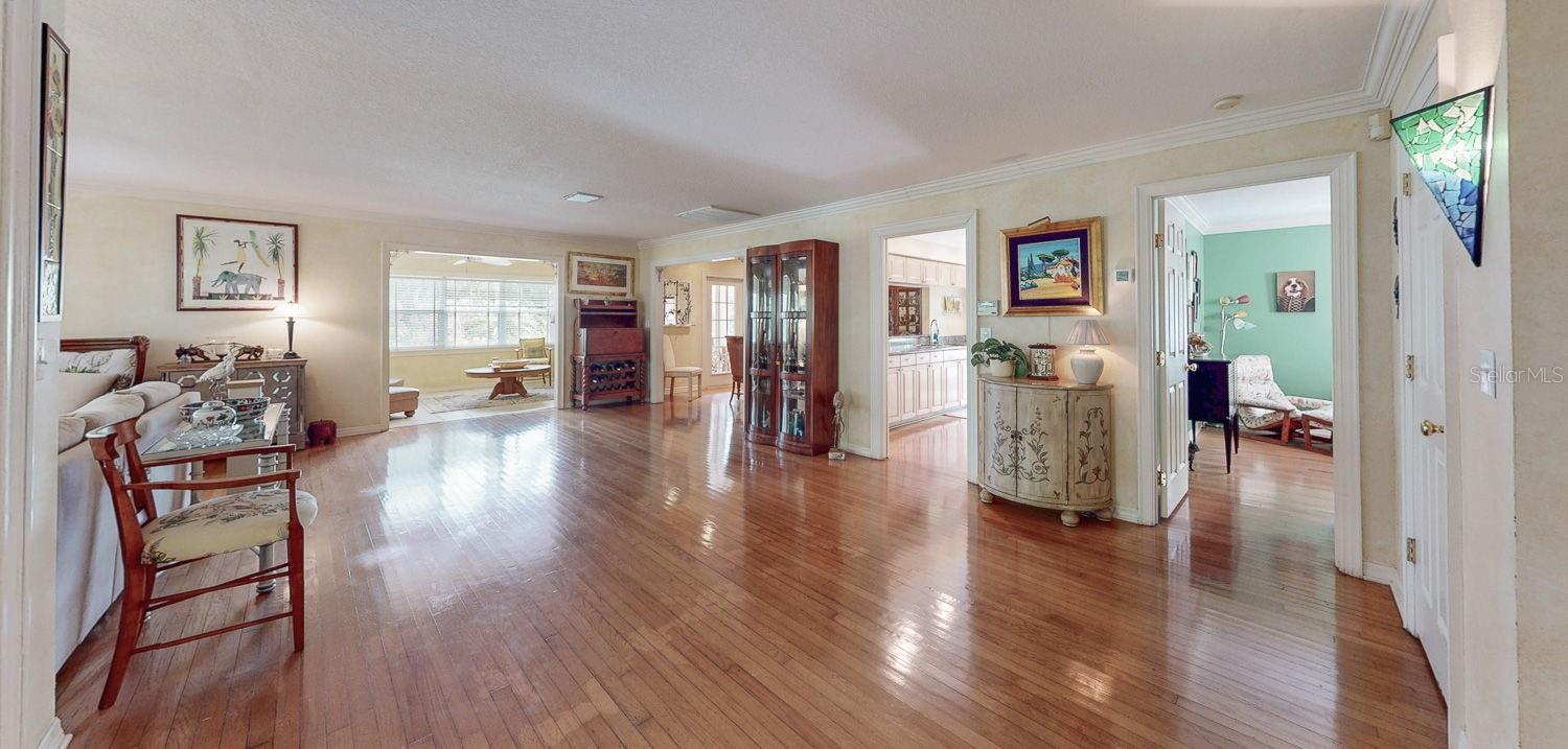 enter this magnificent home to primary/office, to kitchen, dining, family possible den