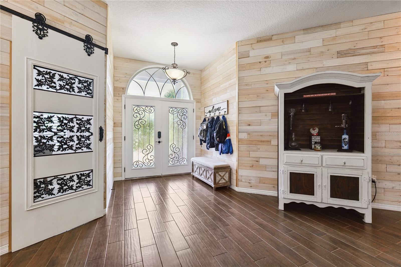 Front Entry w/ Barn Door to Office