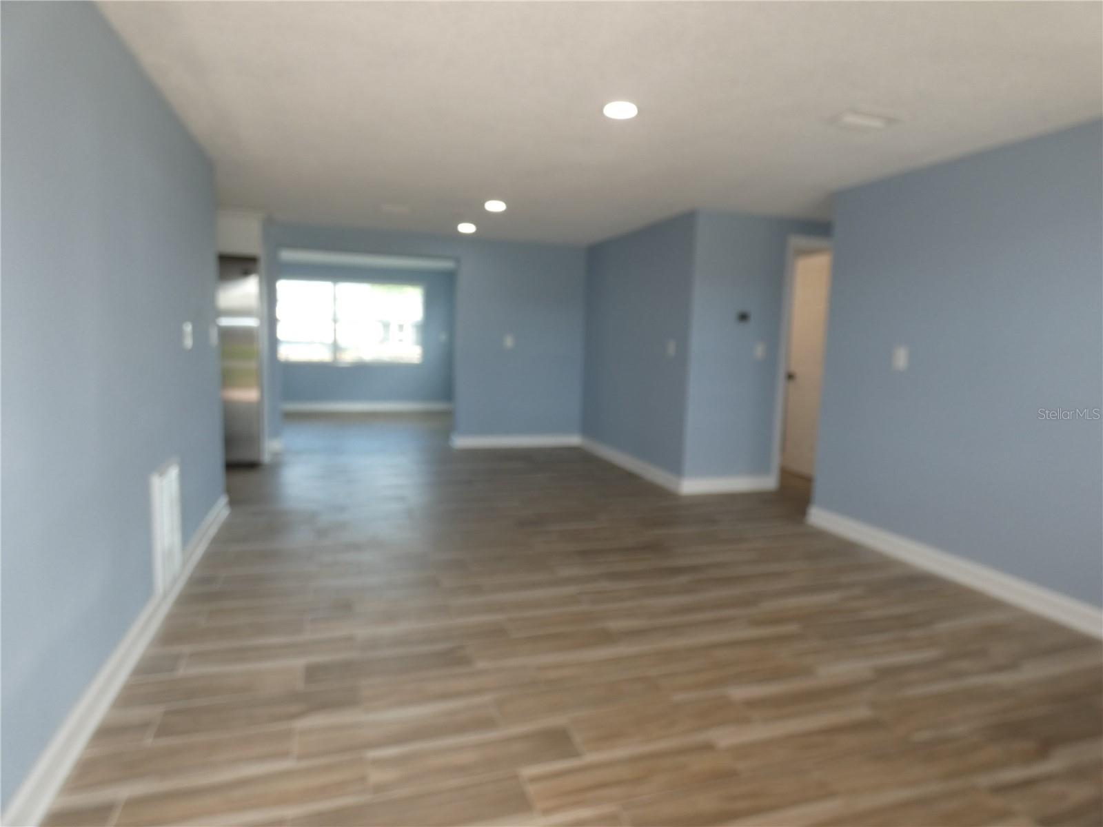 Fresh paint throughout and new ceramic plank tile.