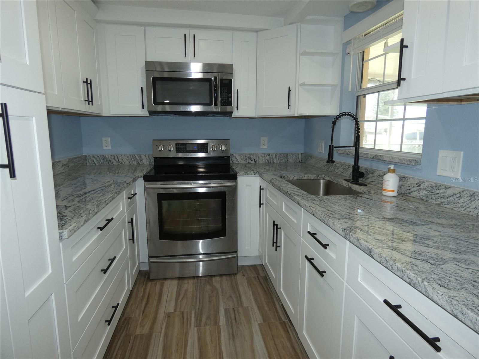 Brand new kitchen with brand new appliances.