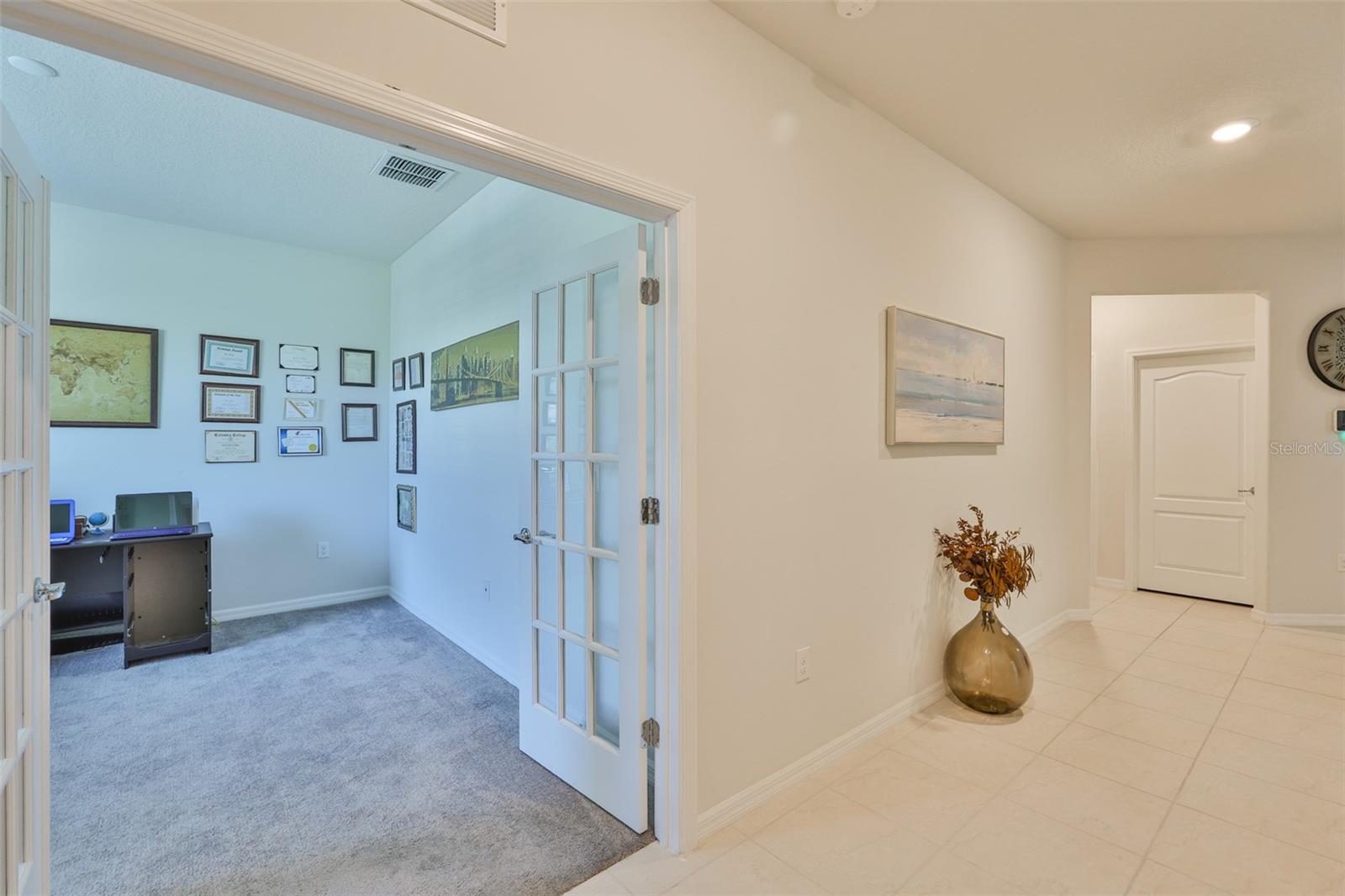 OFFICE ROOM WITH BEAUTIFUL FRENCH DOORS.