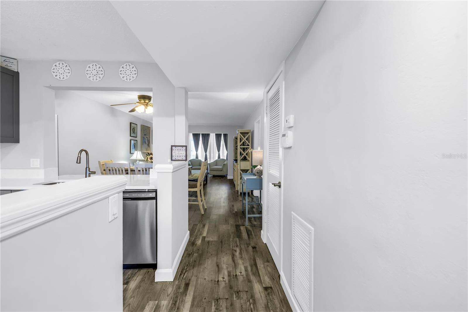 Step inside to discover expansive living spaces adorned with Luxury Vinyl flooring throughout and high-impact windows and sliding doors.