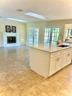 Kitchen to Great Rm and Fireplace