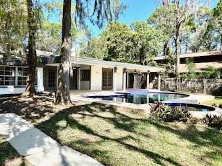 Rear/Pool and sidewalk to dock