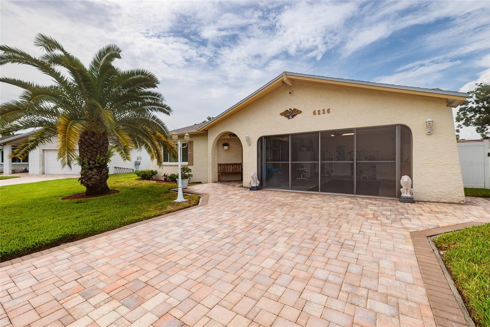 Front w/Brick Paver Driveway