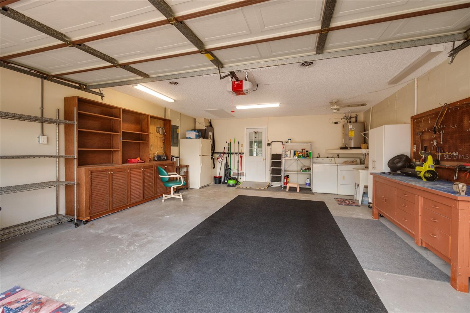 2 Car Garage w/W,D,Utility Tub & 2nd Fridge