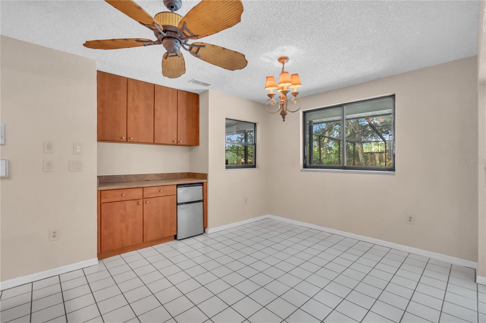 More storage in the Kitchen Nook with small refrigerator.