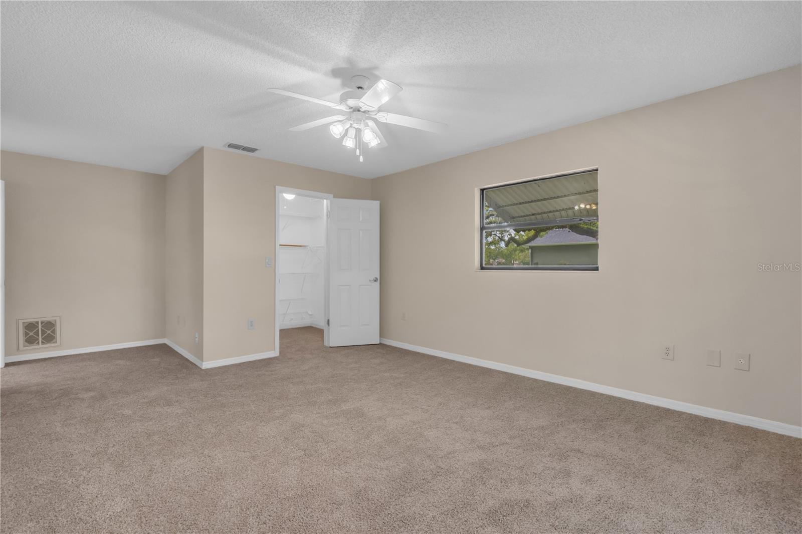 Bedroom 3 with walk-in closet.