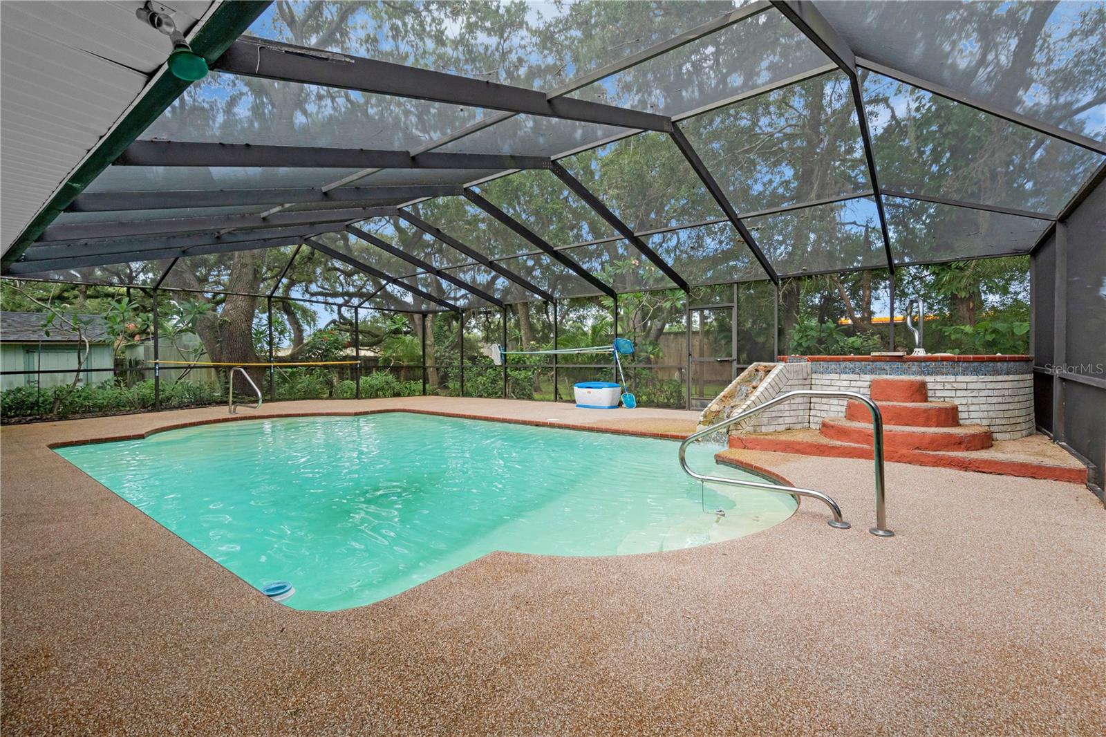 Another view of the pool and hottub and expansive patio space. Space was just rescreened.