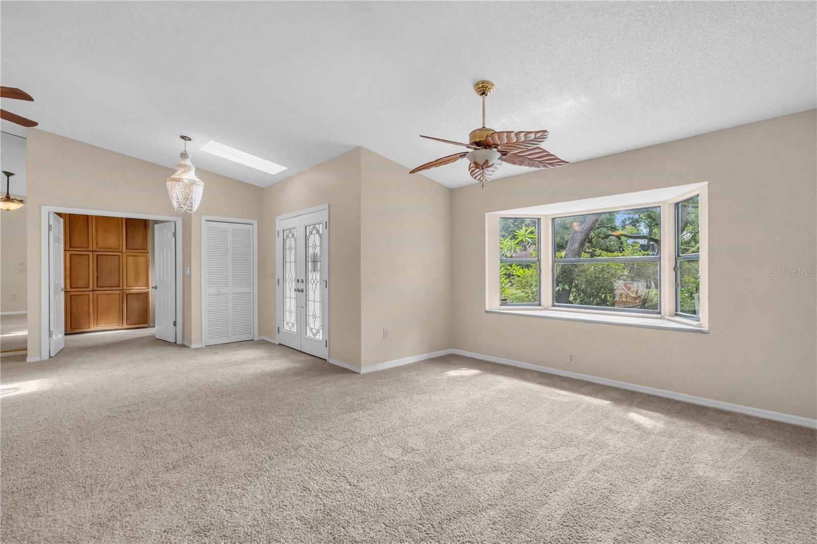 Entry Way with new skylight, Dining Room, and entry into the Master Bedroom