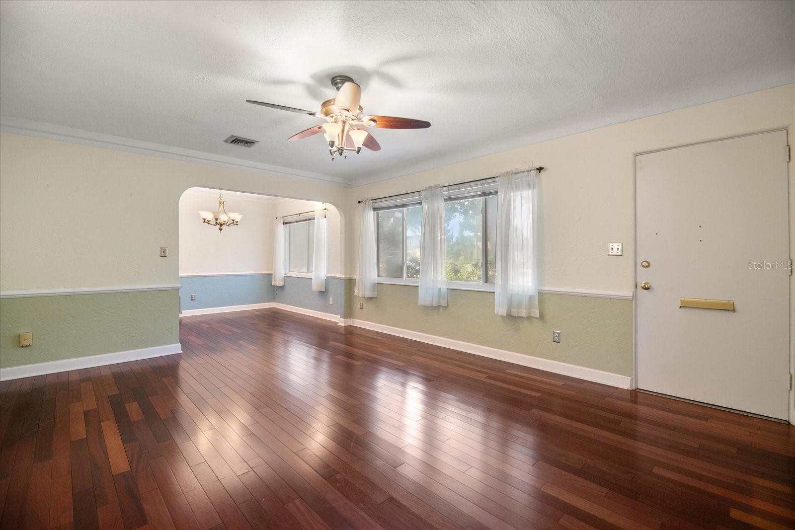 Beautiful Wood Floors and Arched Doorways