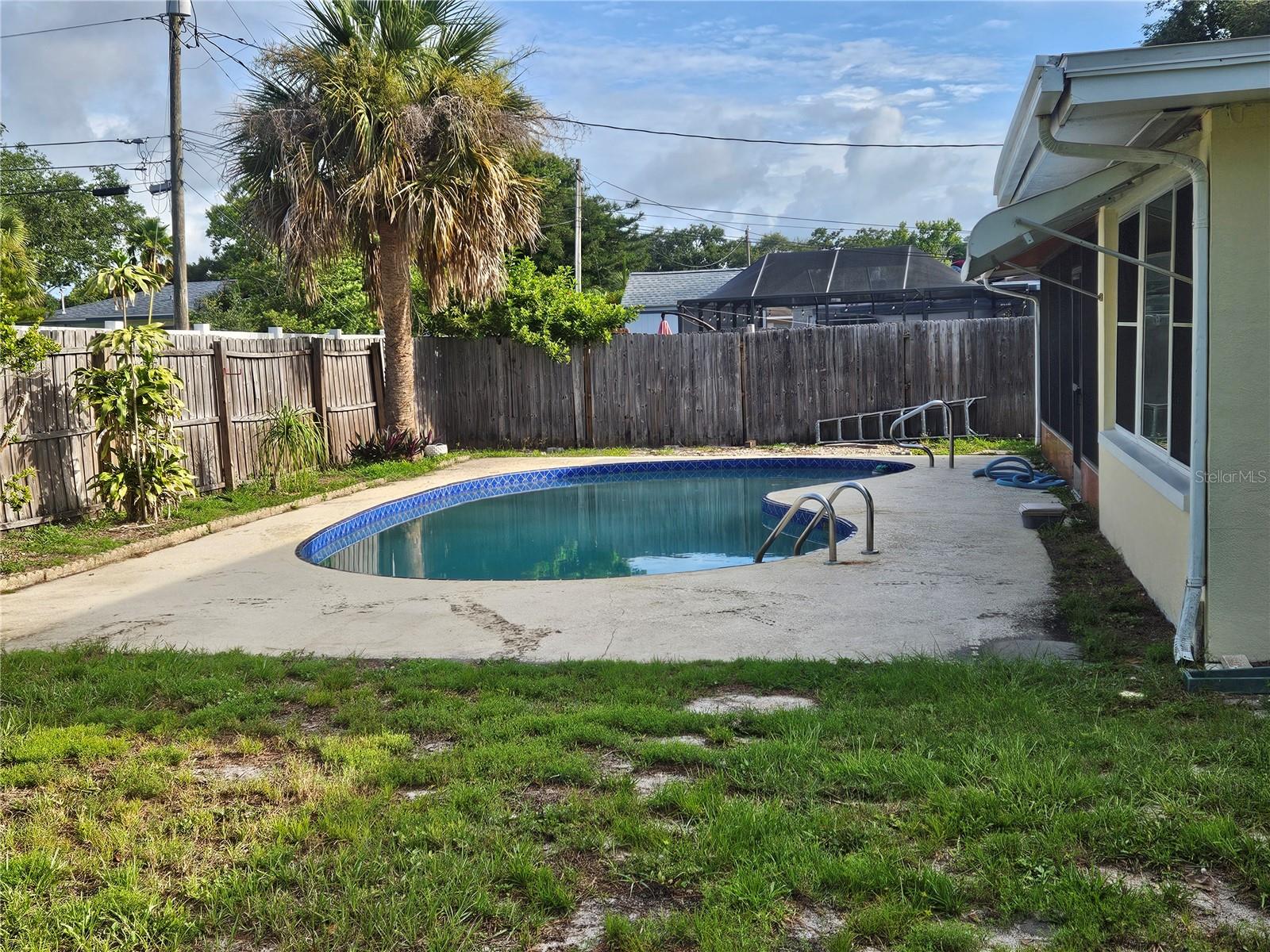 Huge Back Yard with Pool and Screened Patio