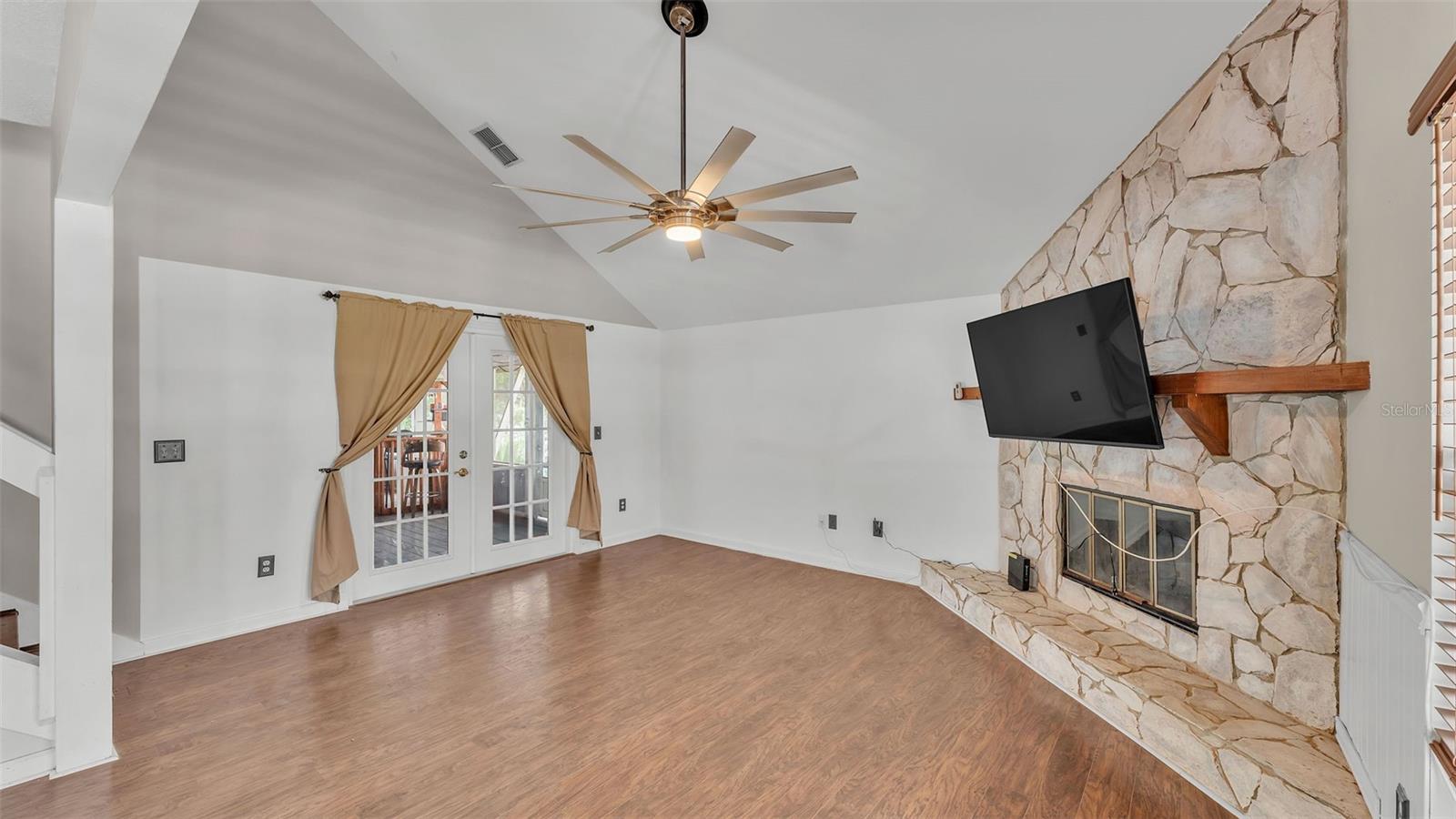 Fireplace in Living room + Exterior enclosed wrap around patio access