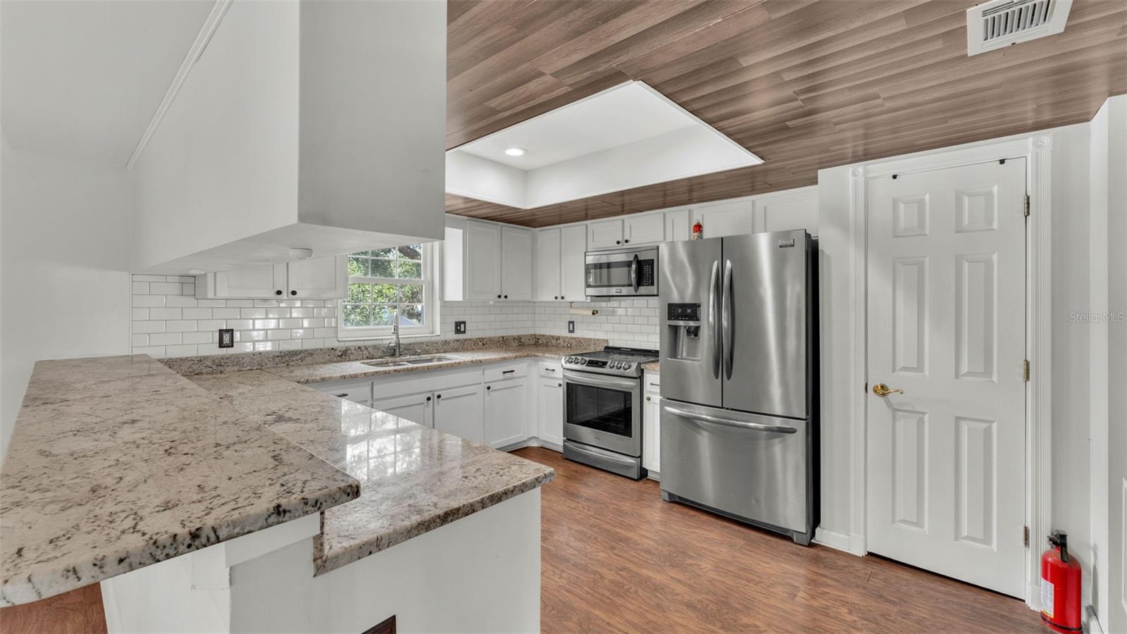 Kitchen with granite countertops & Updated appliances