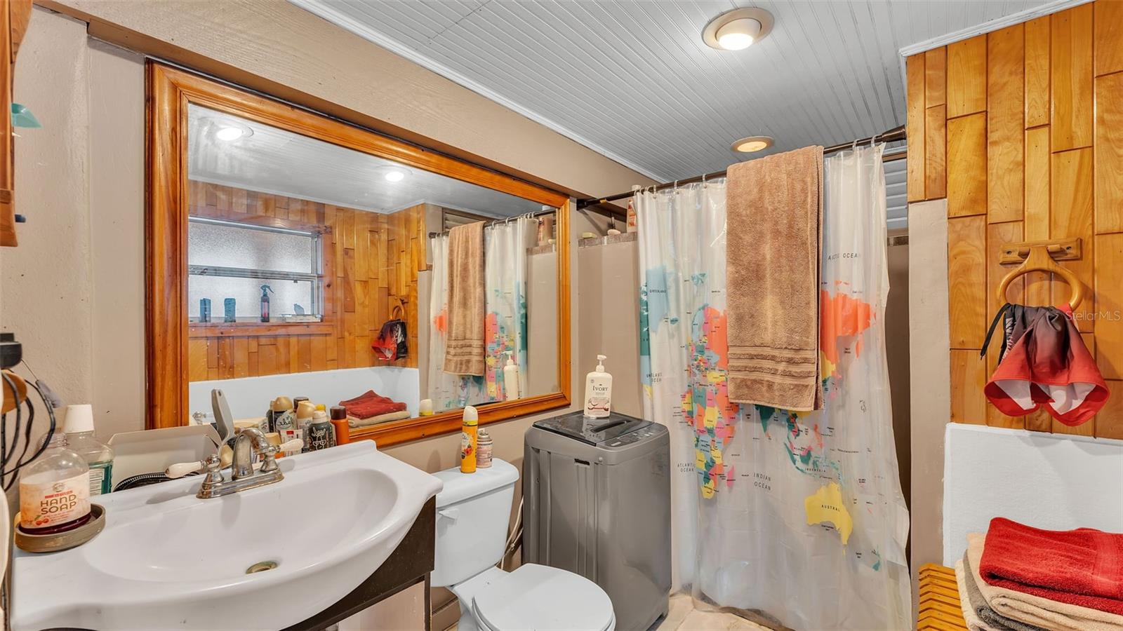 Full bathroom with shower + washer!