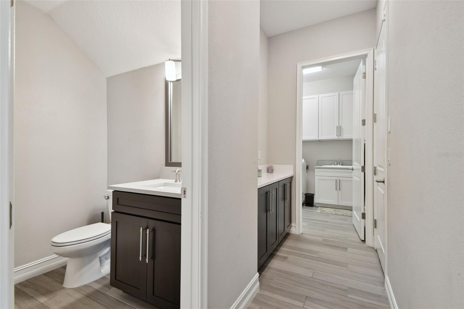 Half bath and hallway to laundry