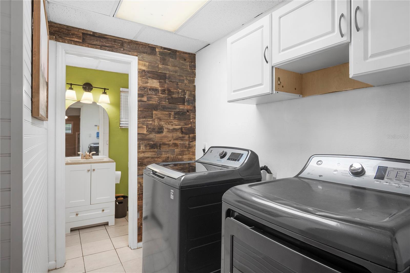 Laundry room with half bath