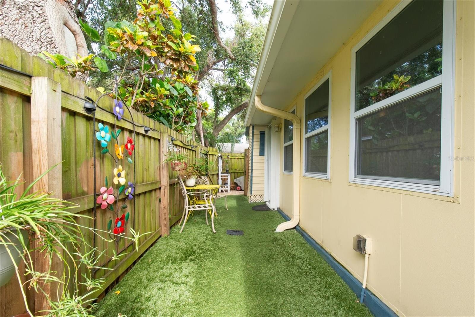 Artificial turf!!Never have to cut the grass inside the fence!!