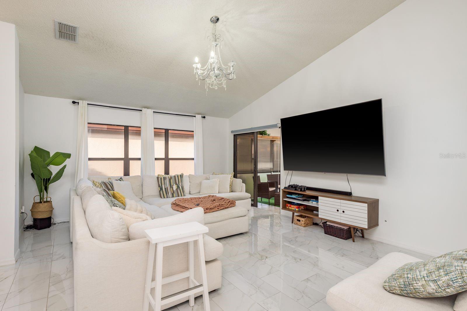 Spacious family room with high ceilings