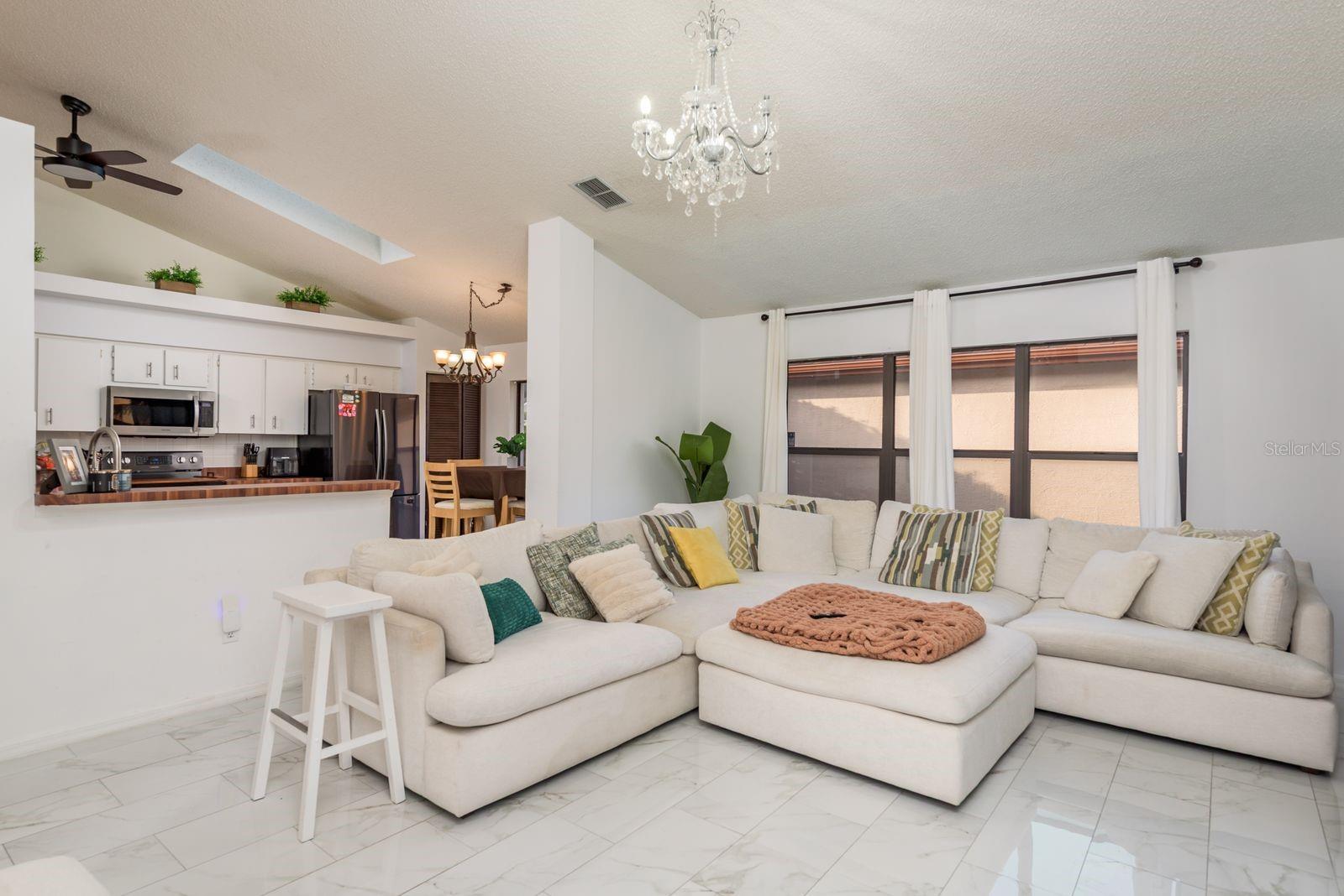 Spacious family room with high ceilings