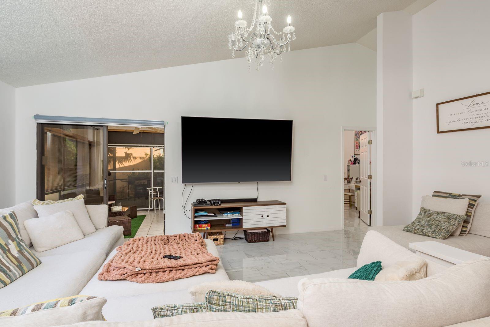 Spacious family room with high ceilings