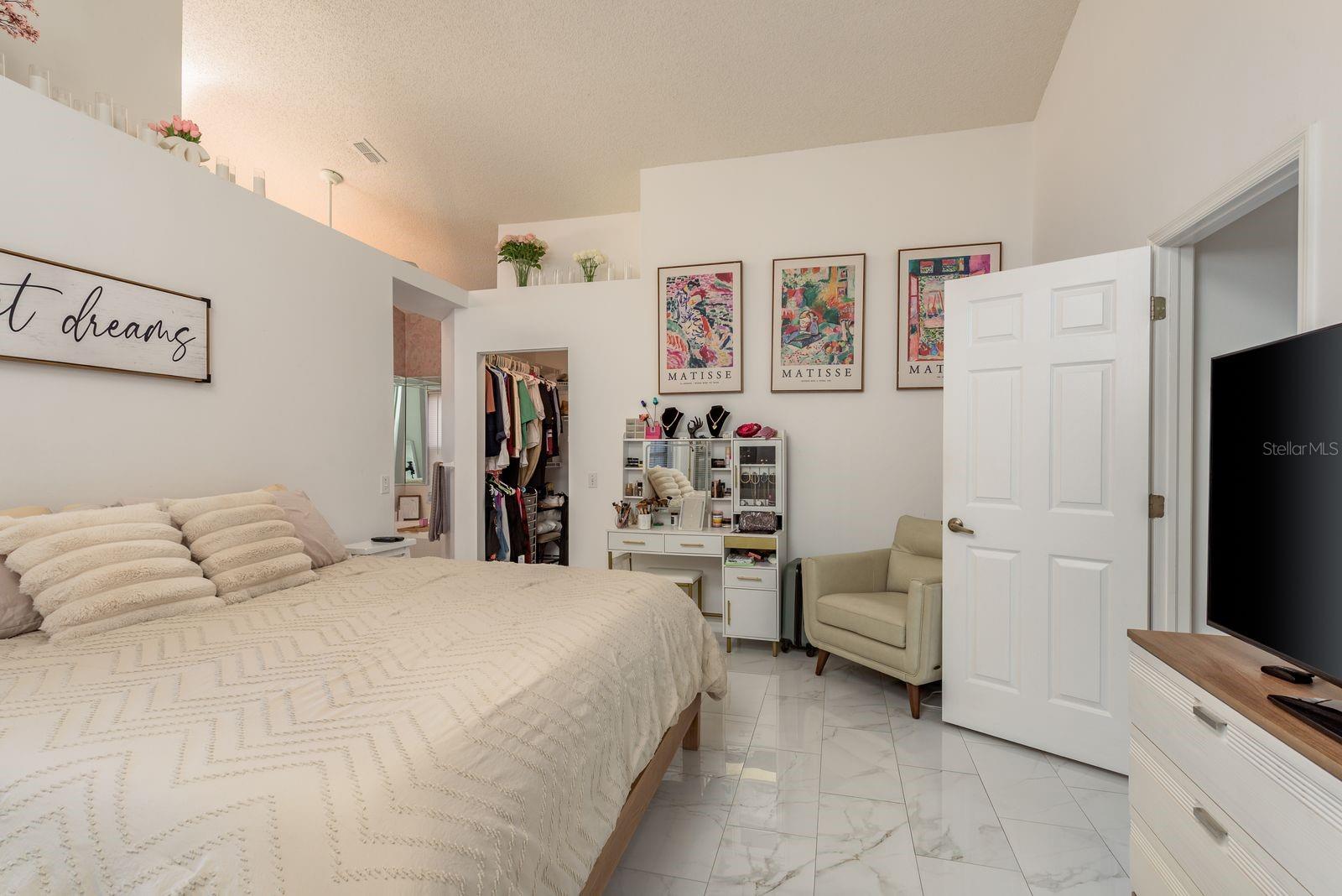 Spacious Primary Bedroom with High Ceilings