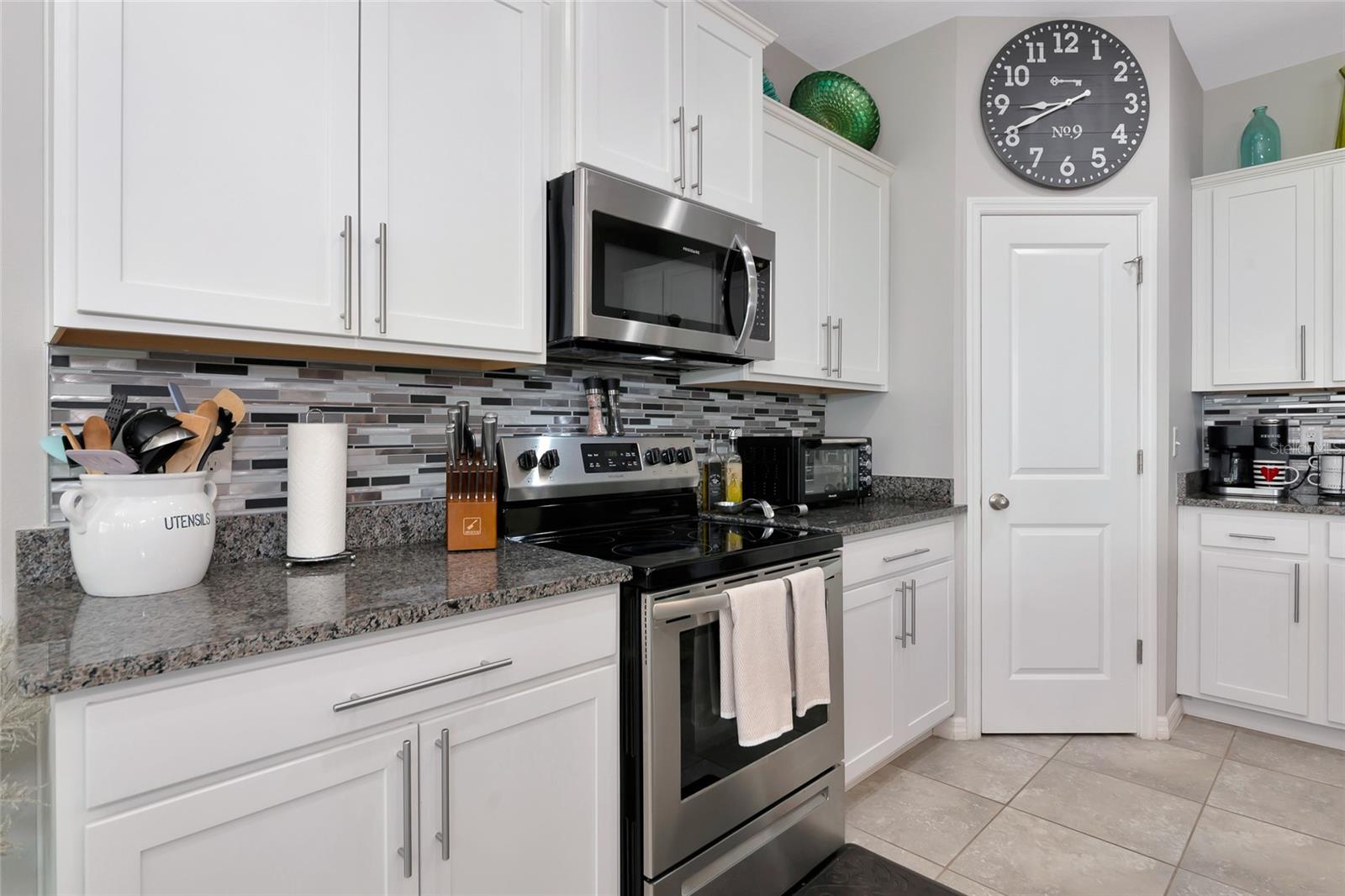 Tons of cabinets and walk in pantry