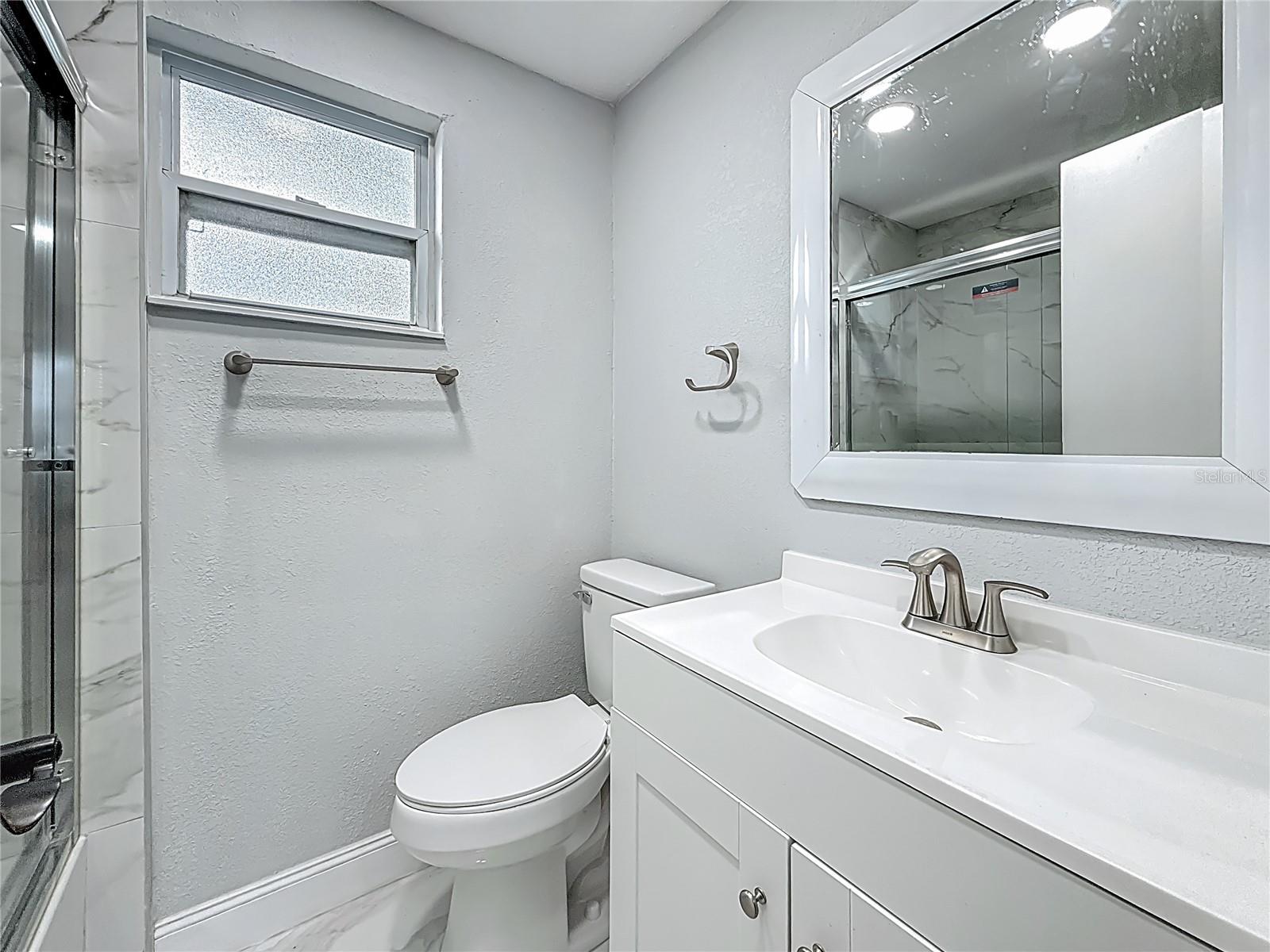 2nd Bath with shower and tub and new fixtures