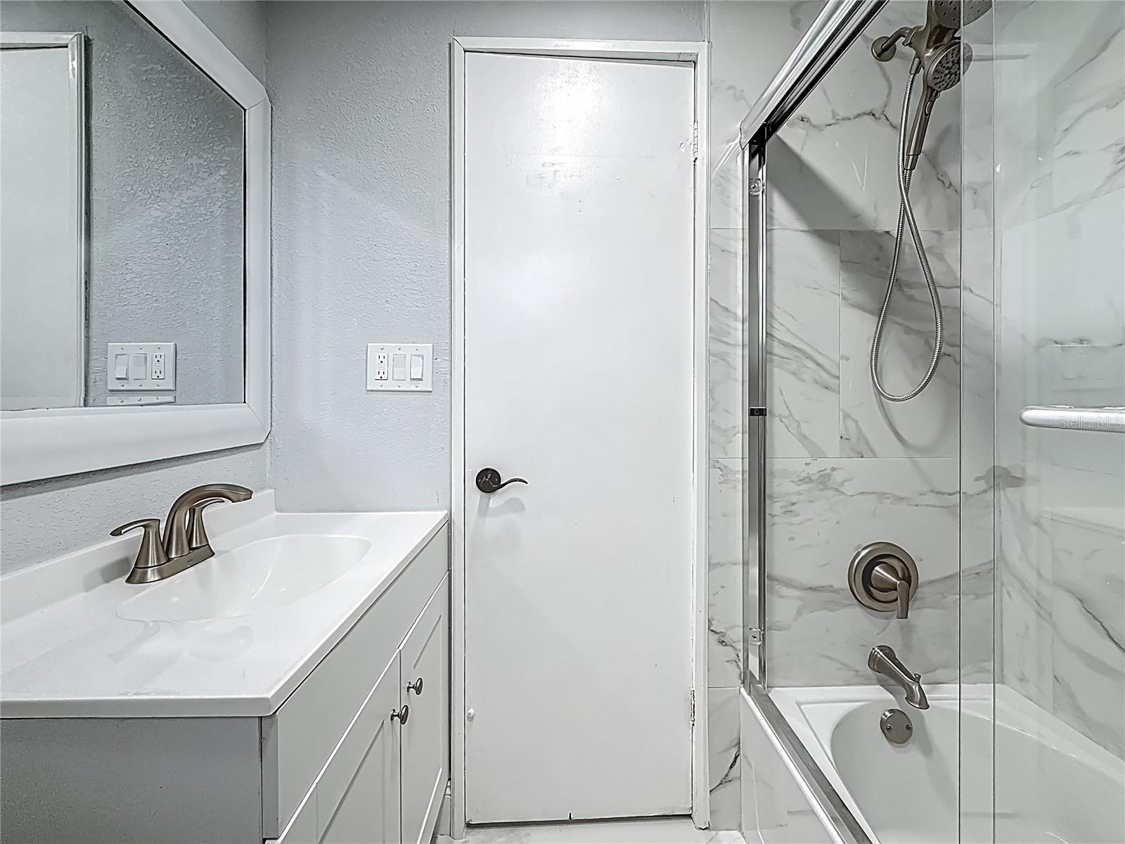 2nd Bath with shower and tub and new fixtures