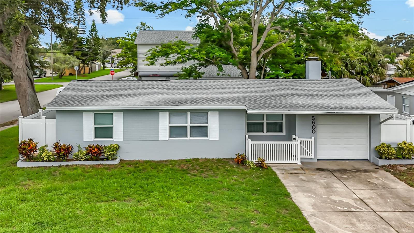 Completely Renovated 3-Bed, 2-Bath on Oversized Corner Lot. Move-in ready with a new roof (June 2025), double driveway, 1-car garage, and covered entry.