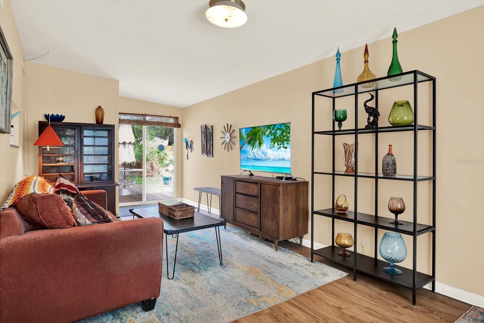 Family room with sliding door access to deck